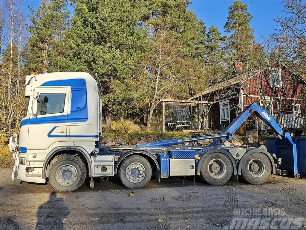 Scania R560 8x4 koukku Camiones polibrazo