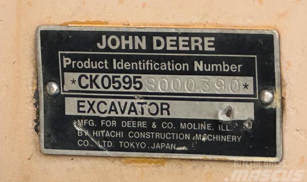 John Deere 595 Excavadoras de ruedas