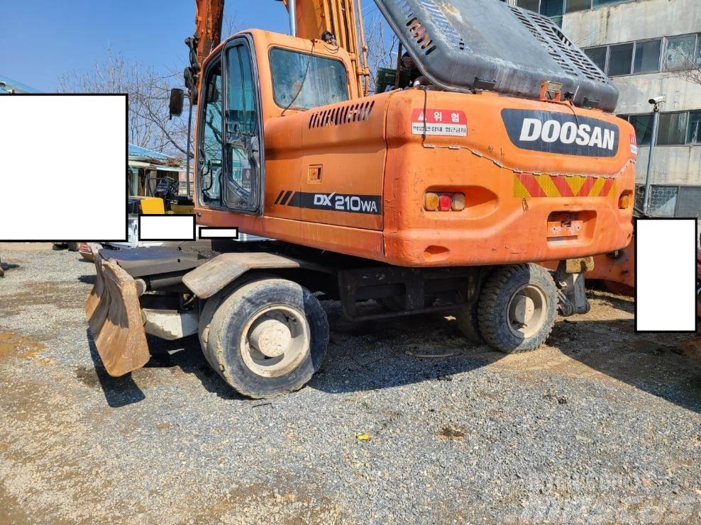 Doosan DX 210 W Excavadoras de ruedas