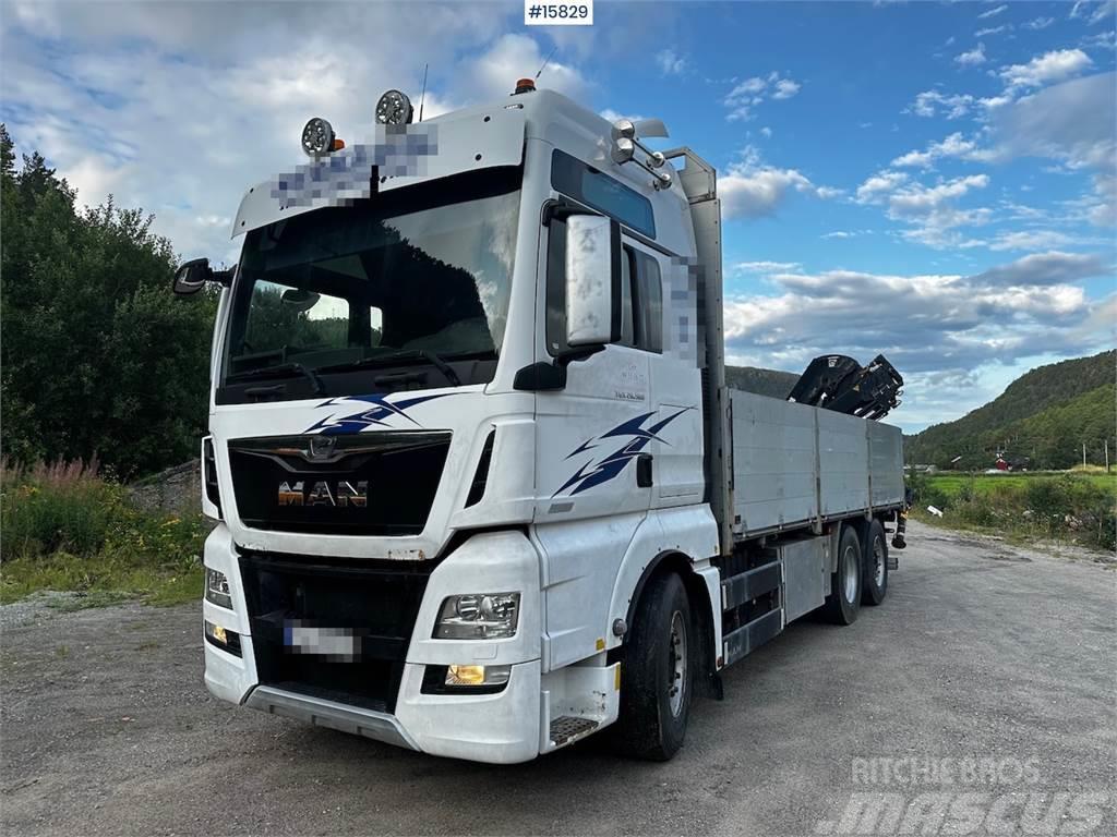 MAN TGX 26.560 Flatbed truck with Hiab 138 crane from  Camiones plataforma
