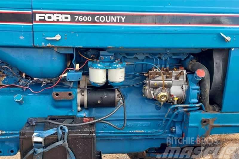Ford County 7600 4WD With Rovic Front End Loader Tractores