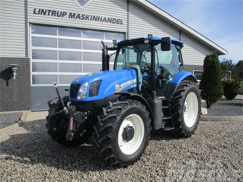 New Holland T6050 Delte med frontlift Tractores