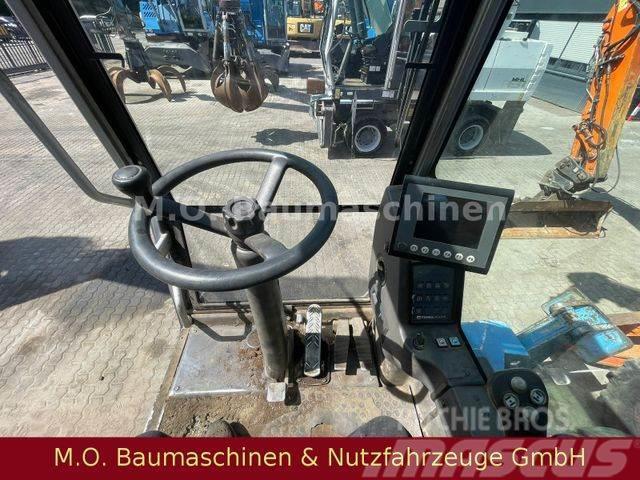 Fuchs MHL 320/ZSA/Hochfahrbare Kabine/ Excavadoras de ruedas
